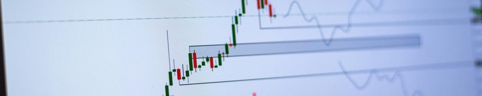 Detailed view of a cryptocurrency trading chart on a computer screen, showing market trends and price movements.